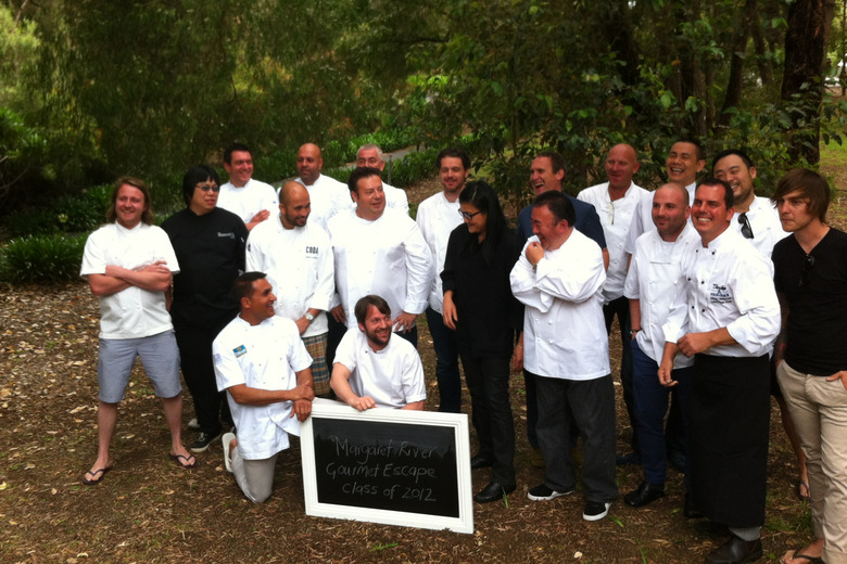 A chef group picture. Rene Redzepi is holding the sign.