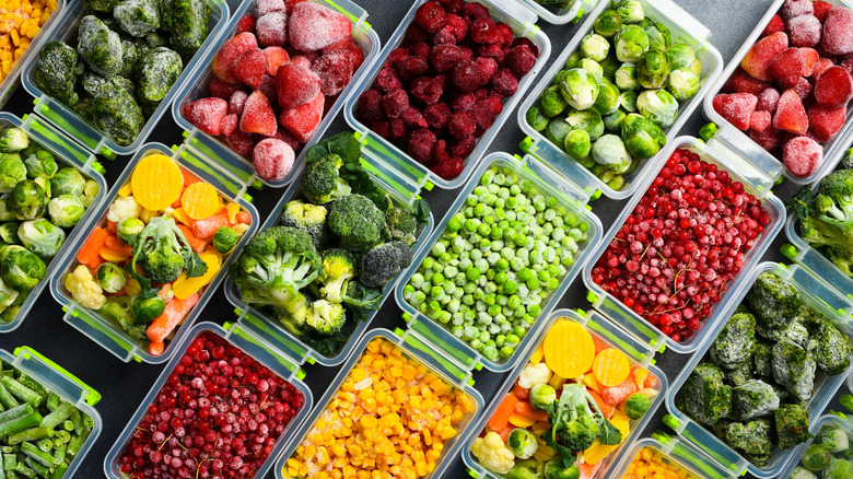 Frozen fruit and vegetables in plastic containers