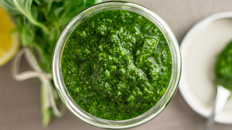 bright green pesto in jar