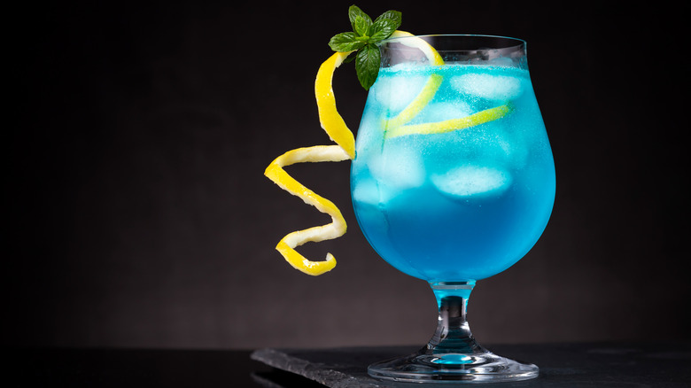 Blue Curaçao cocktail with lemon zest