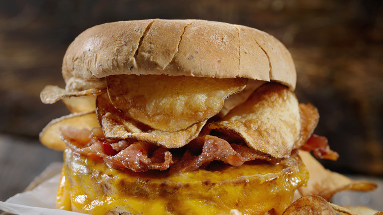 bacon cheddar burger with potato chips inside