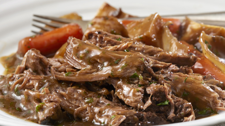 chopped pot roast and sauce on a dinner plate