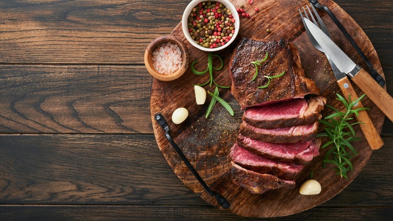 Slice boneless steak