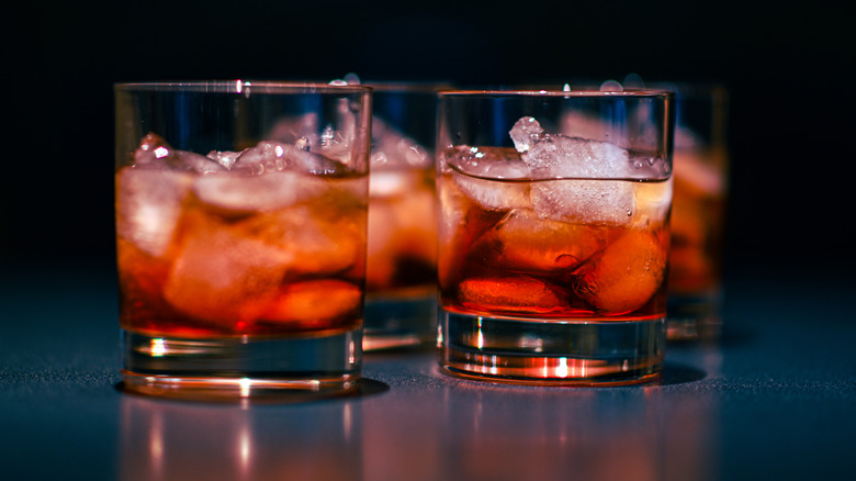 multiple glasses of Negroni cocktails with ice