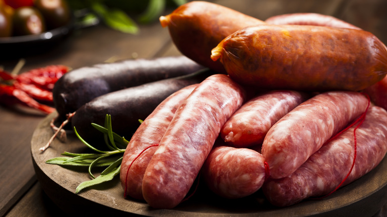 A plate of different sausages.