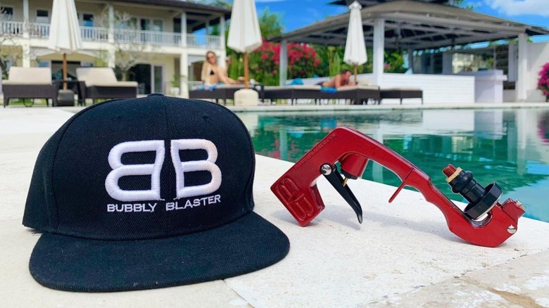 Bubbly Blaster's cap and champagne gun