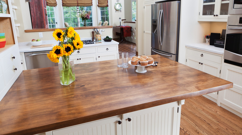 A wood countertop in a farmhouse-style kitchen.