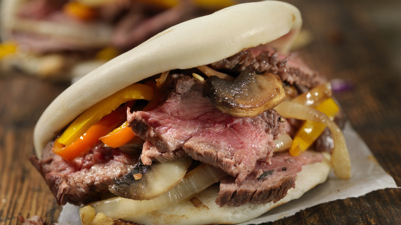 Bao bun sandwich on a cutting board