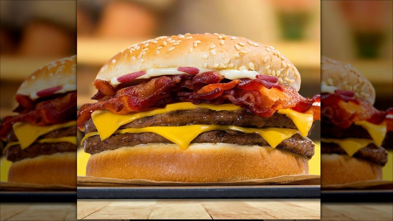 Closeup on a Burger King Bacon King sandwich.