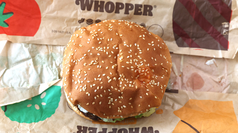 Overhead shot of Whopper sitting on wrapper