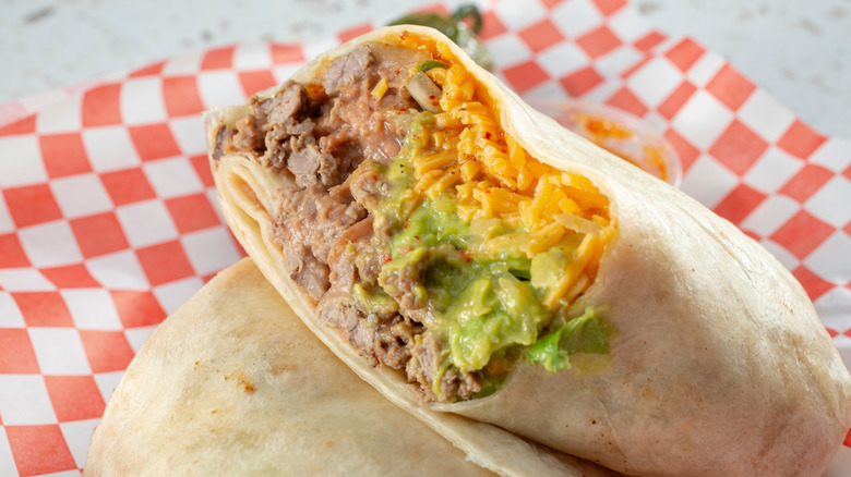 Carne asada burrito on checkered paper