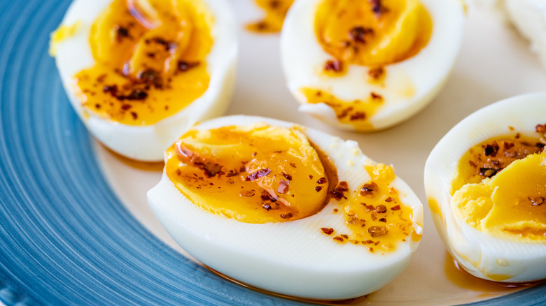 hard-boiled eggs with butter and chili