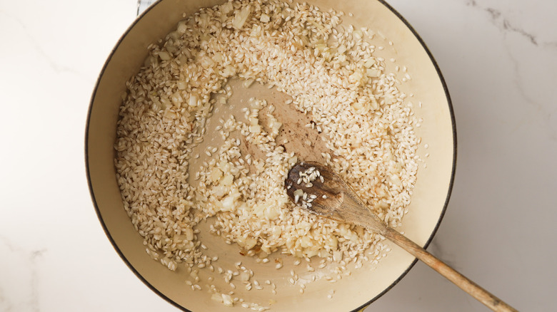 Pot with onions and rice