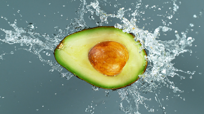 avocado and splashing water