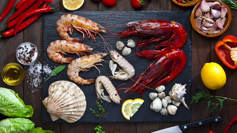assorted seafood on black slate