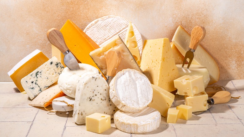 A pile of various cheeses