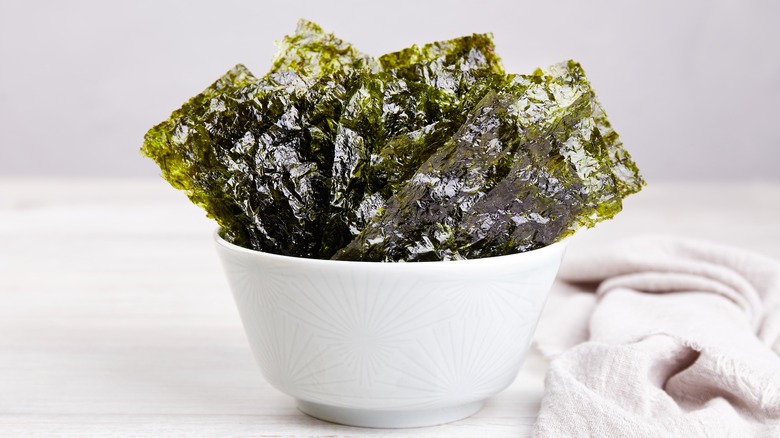 nori sheets in ceramic bowl