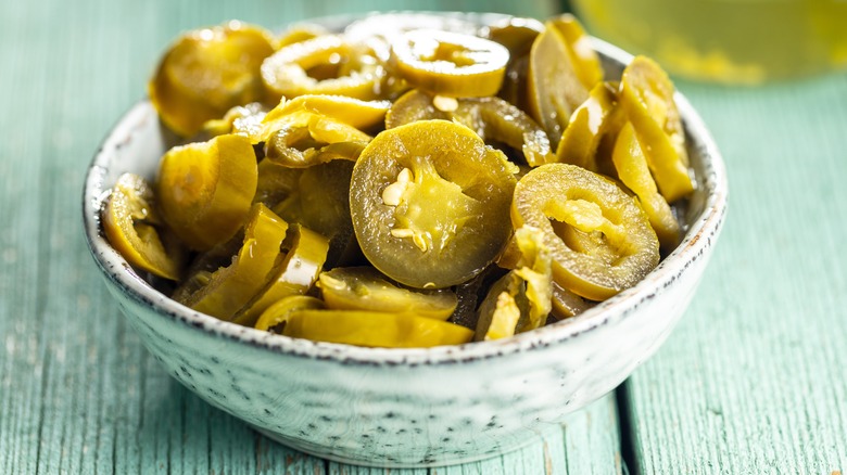 white bowl of pickled jalapeños