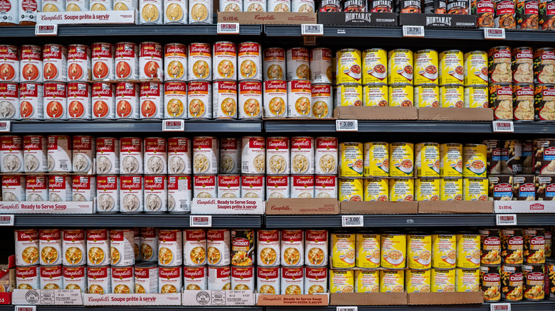 A canned soup aisle at a grocery store.