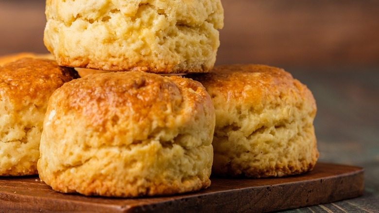 fluffy scones on wooden board