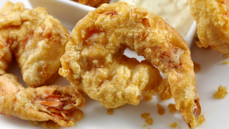 Crispy fried shrimp on plate