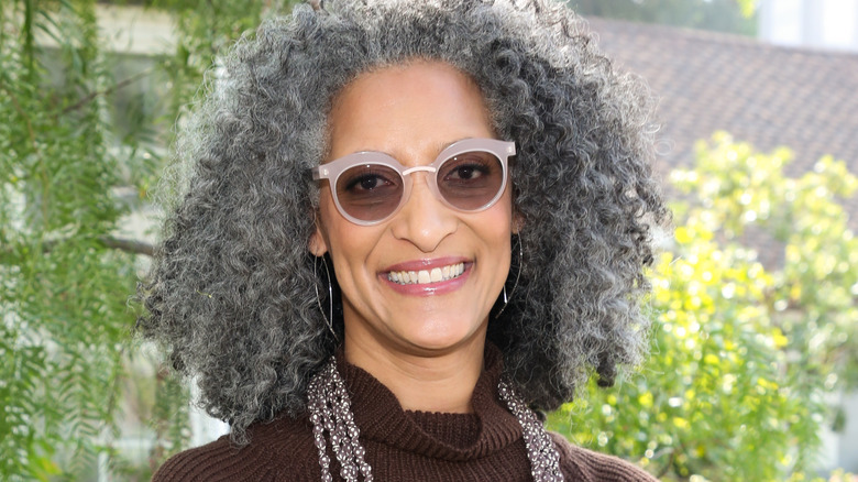 Chef Carla Hall wearing brown turtleneck 