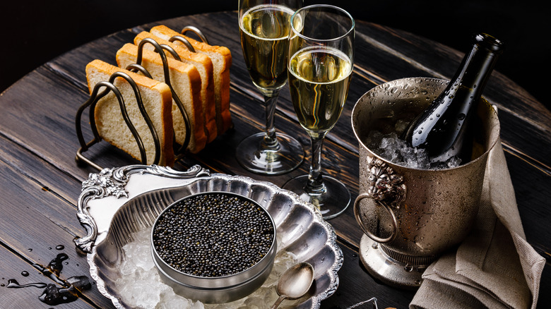 Tin of caviar and mother of pearl spoon