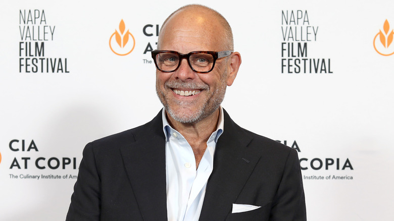 Alton Brown in front of Napa Valley Film Festival step and repeat
