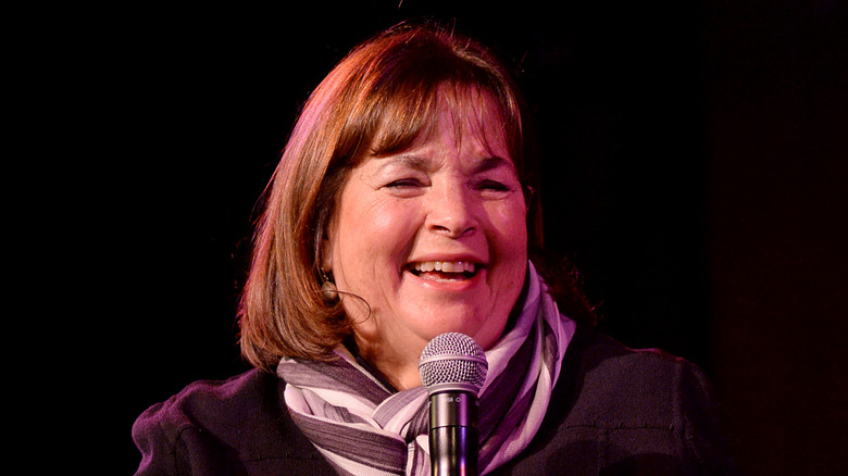 Ina Garten smiling with microphone