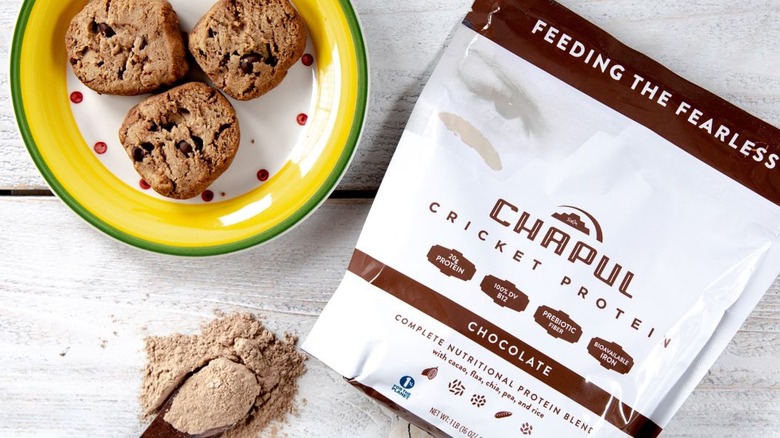 Chapul's protein powder next to a plate of cookies