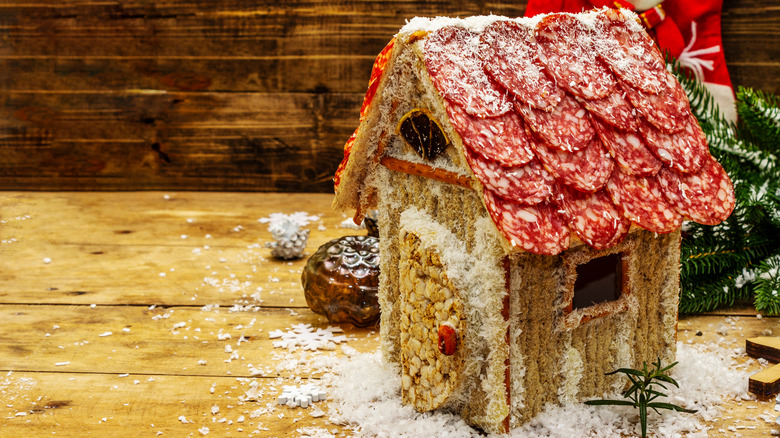 Charcuterie chalet against wood backdrop