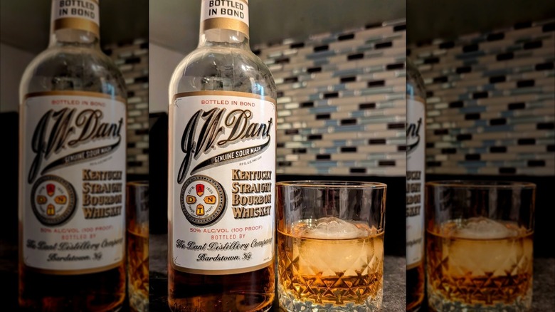 Bottle and glass of J.W. Dant bourbon