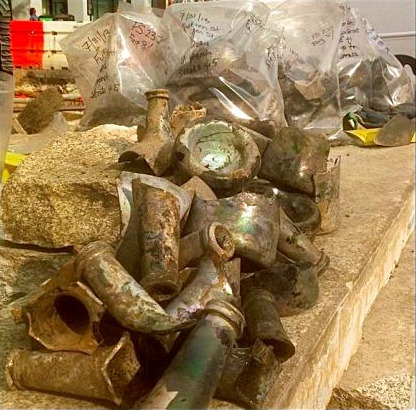 A collection of old booze bottles - some with corks still intact - were found buried in the FiDi.