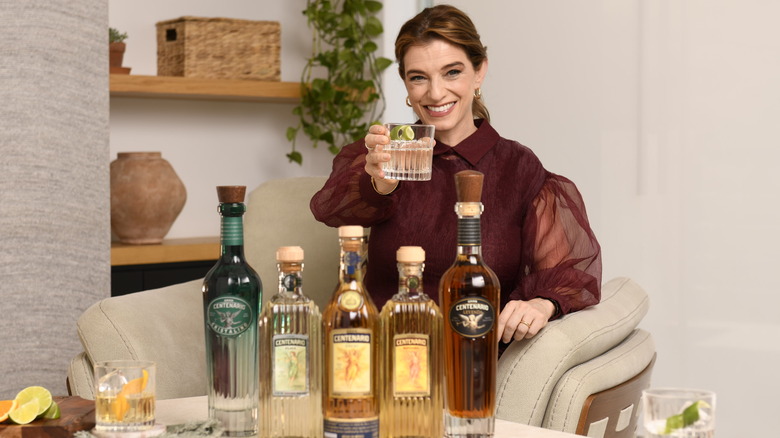 Pati Jinich holding glass with tequila