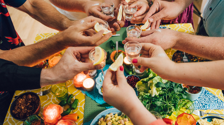 Shots of tequila with food