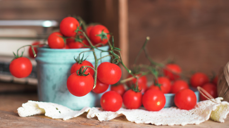 Cherry tomatoes on a wooden table.