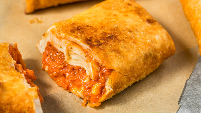 A Chicago-style pizza puff stuffed with sauce and cheese.