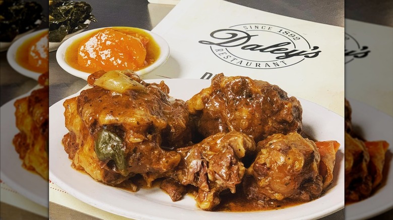 A meal from Daley's Restaurant pictured alongside a menu.