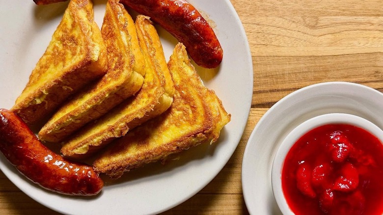 French toast, sausages, and strawberries served at Daley's.