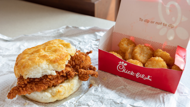 Chick-fil-A chicken biscuit and hash browns.
