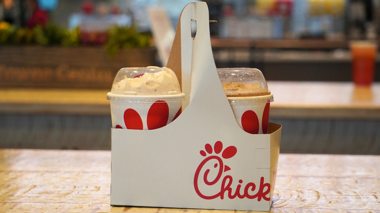 Chick-fil-a S'mores Milkshake and S'mores Frosted Coffee in a two-cup disposable cup holder.