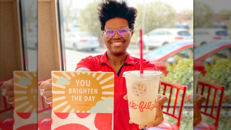 A cheerful Chick-fil-A employee