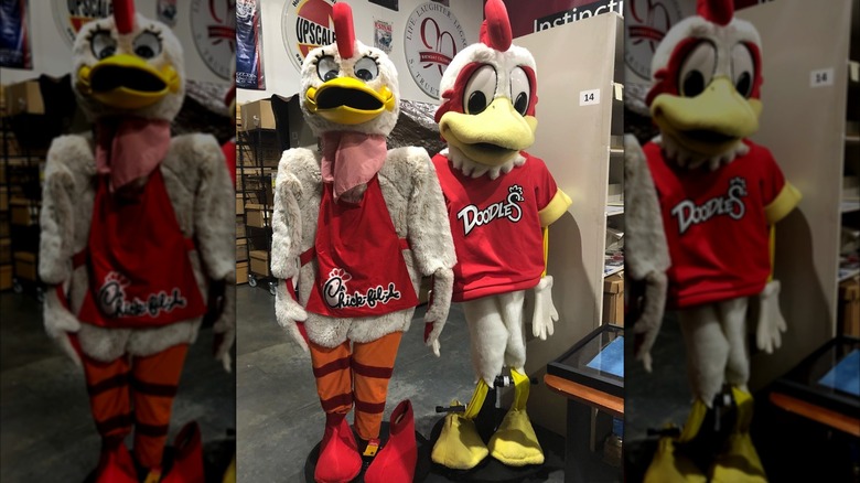 Two versions of the Doodles costume are worn at an event