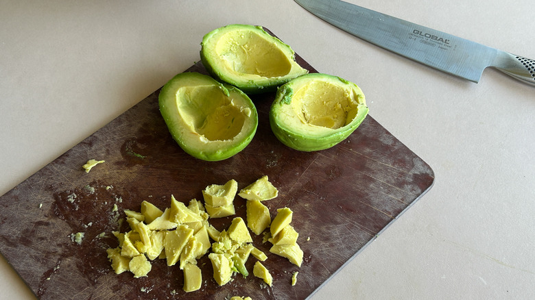 chopped avocado cutting board