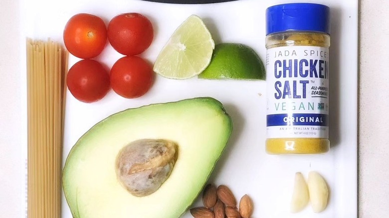 vegan chicken salt with assorted fruit, garlic, and almonds