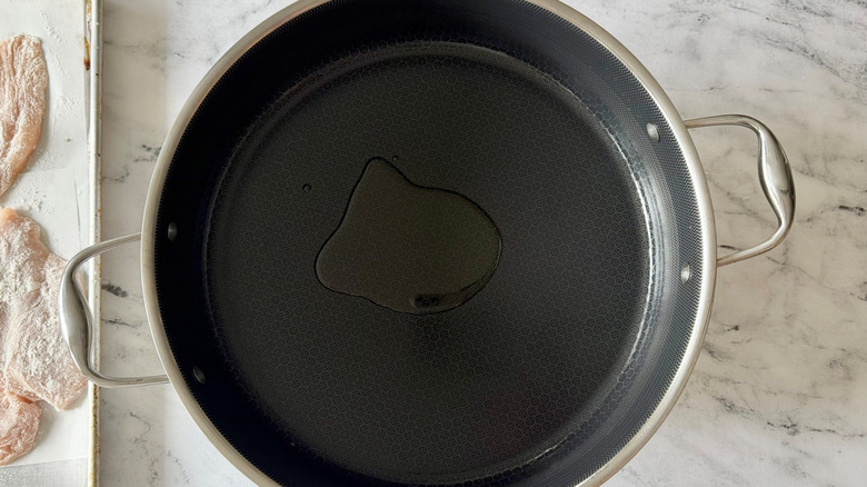 Drizzle of oil in pan