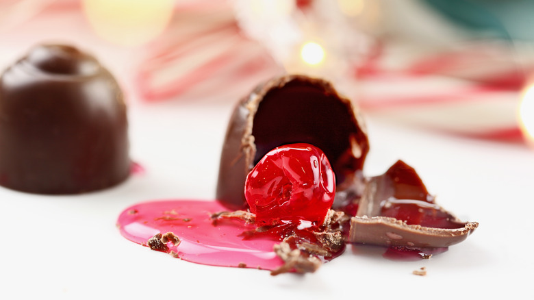 Closeup of a broken-open chocolate-covered cherry