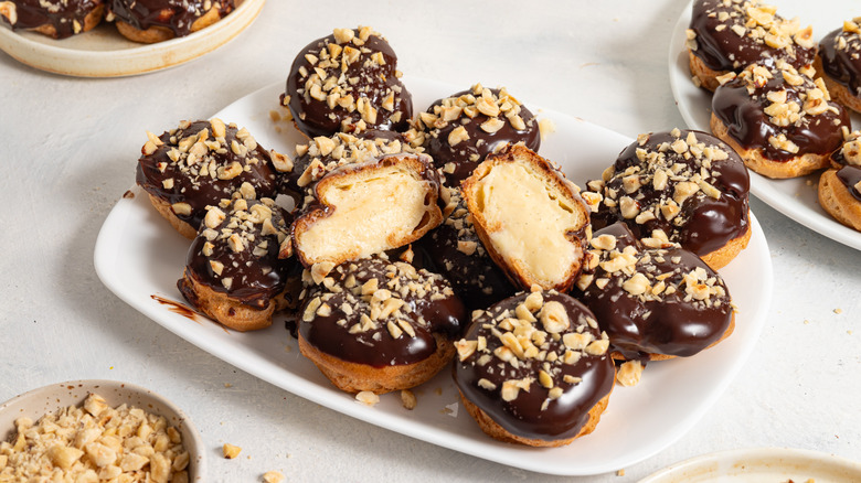 chocolate profiteroles on plate