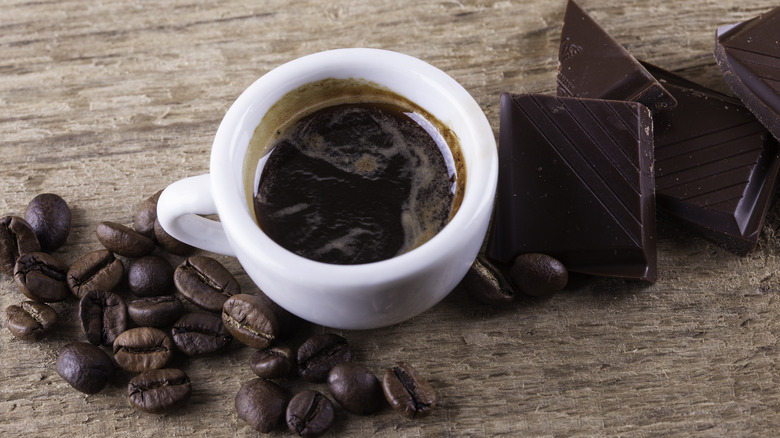 Coffee with beans and chocolate pieces