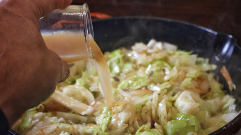 pouring cider into pan